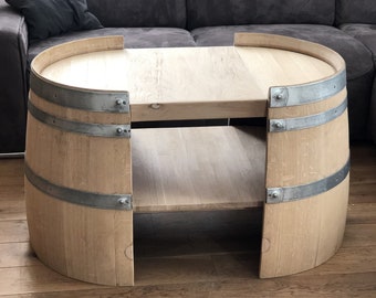 Short coffee table made from wine barrel halves