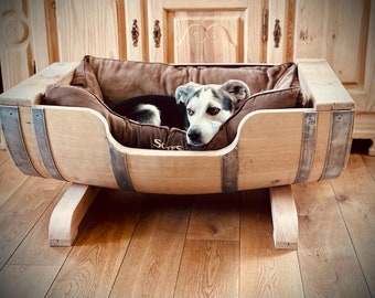 Dog bed made from used red wine barrels