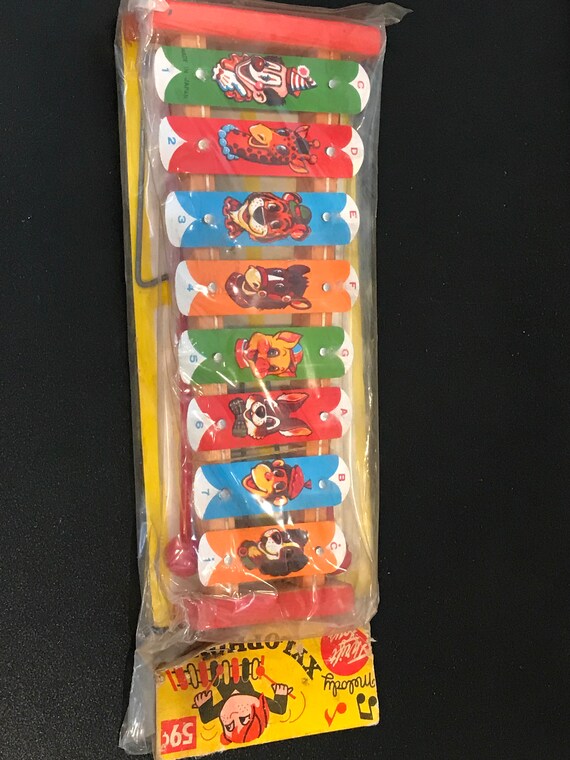 Vintage tin Xylophone in original package with graphic header Etsy