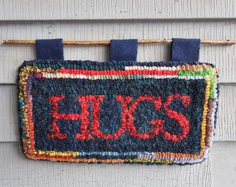 HUGS, Hooked Wool Mat or Wall Hanging