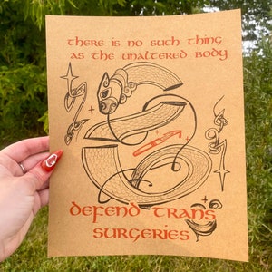 May include: A brown paper print with black ink and red text. The text reads "there is no such thing as the unaltered body" and "defend trans surgeries". The print features a stylized illustration of a dragon.