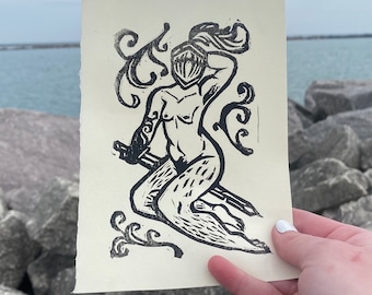 knight pinup lino print