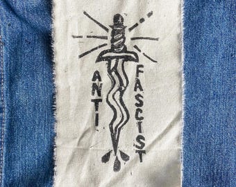 anti fascist sew on patch / lino printed