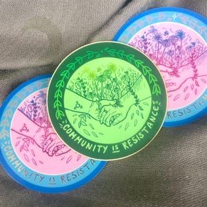 La communauté est un autocollant en vinyle résistant