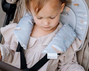 Shoulder pads, seatbelt covers, strollerbelt covers