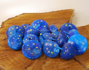 Wooden gyro painted with stars