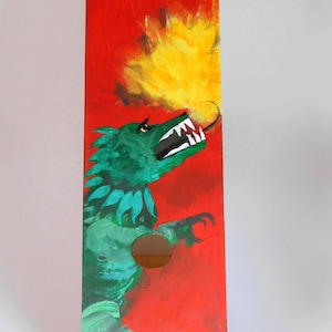 Magazine file painted with a dragon
