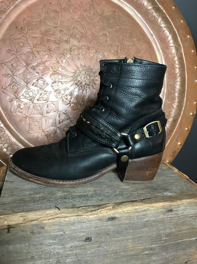 snakeskin studded boots
