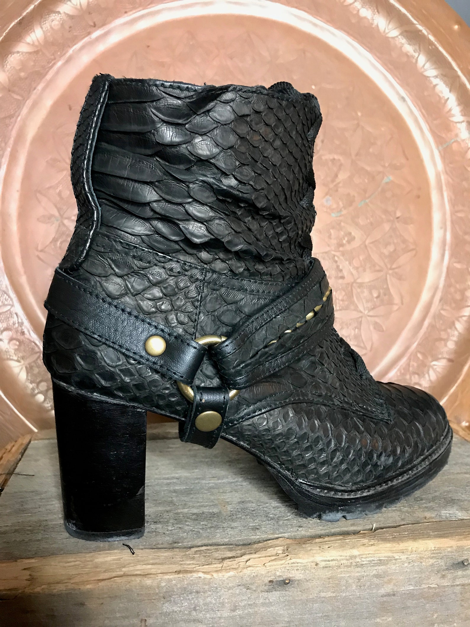 snakeskin studded boots