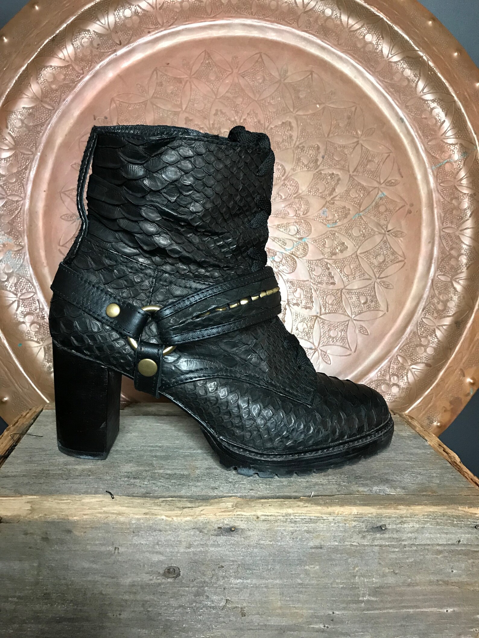 snakeskin studded boots