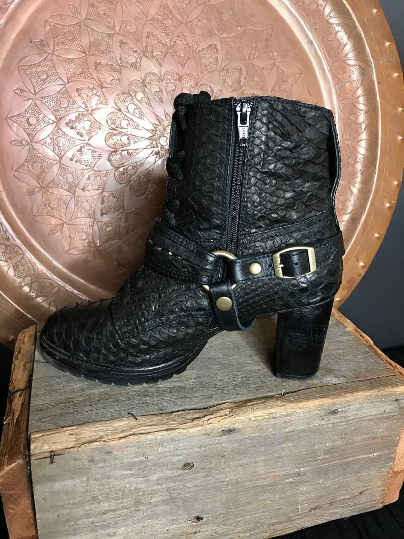 snakeskin studded boots