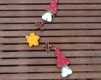 Autumnal necklace with mushrooms