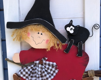 Witch Bruni on her broom