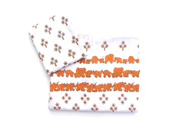 Linge de lit enfant années 70 "Elephant Parade" blanc-orange RDA