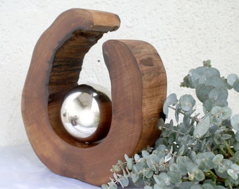 Wood art, wooden sculpture with stainless steel ball, pear tree with ball