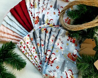 Adventskalender aus Stoff - mit Stoffsäckchen zum selbst befüllen in grau - weiß  - gold - rot  mit Weihnachtsmann und Schlitten