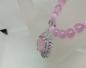 Necklace with kunzite pendant and pink mexican opal