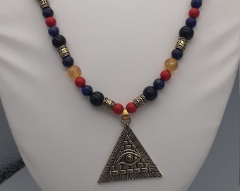 Egyptian necklace with pyramid eye of Ra pendant