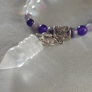 Necklace of quartz, amethyst,  pendant of carved quartz.