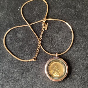 Copper Penny in a rosegold plated locket with a matching 18 inch rose gold tone stainless steel rope necklace. 4 available, choose by year