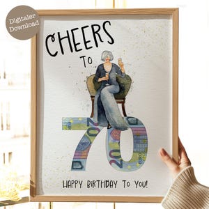 Op de afbeelding: Een aquarel-illustratie van een vrouw die op een stoel van eurobiljetten zit. De vrouw houdt een glas champagne vast en het nummer 70 is gemaakt van eurobiljetten. De tekst "CHEERS TO" en "HAPPY BIRTHDAY TO YOU!" staat op de kaart.