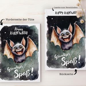 May include: A printable Halloween treat bag template featuring a cute cartoon bat with a toothy grin. The front of the bag says "Happy Halloween" and the back says "Gruseliger Spa&szlig;!" which translates to "Spooky Fun!" in English.
