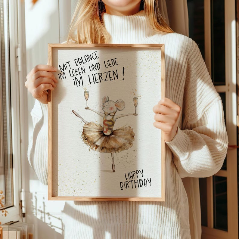 May include: A watercolor illustration of a mouse wearing a tutu and holding two glasses of champagne. The text reads "Mit Balance im Leben und Liebe im Herzen! Happy Birthday".