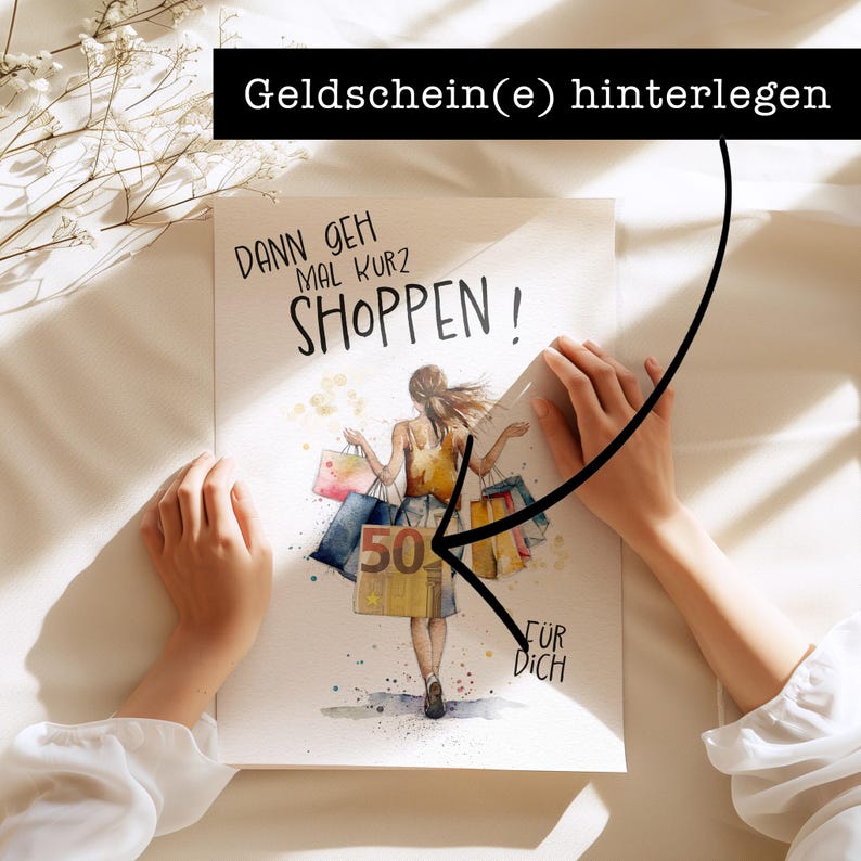 May include: A watercolor illustration of a woman with shopping bags, with the text "Dann geh mal kurz shoppen!" and "F&uuml;r dich" on the image. The text "Geldschein(e) hinterlegen" is written above the image.