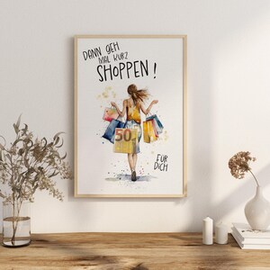 May include: A watercolor illustration of a woman with shopping bags. The text on the image reads "Dann geh mal kurz shoppen!" and "F&uuml;r dich".