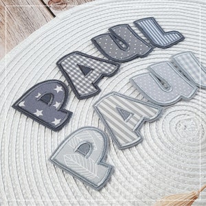 From 6.20 euros: iron-on name, from 3 letters in gray and white image 1
