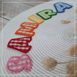 From EUR 6.20: Name appliqué in the color of your choice, from 3 letters