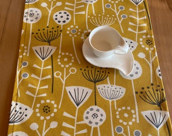 Mustard colored table runner, dandelions, Scandinavian style,