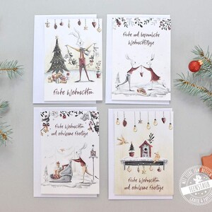 Kerstkaarten Wenskaarten voor Kerstmis in een set van 4 lieve ansichtkaarten in het Duits, met een paar konijntjes die zich voorbereiden op Kerstmis