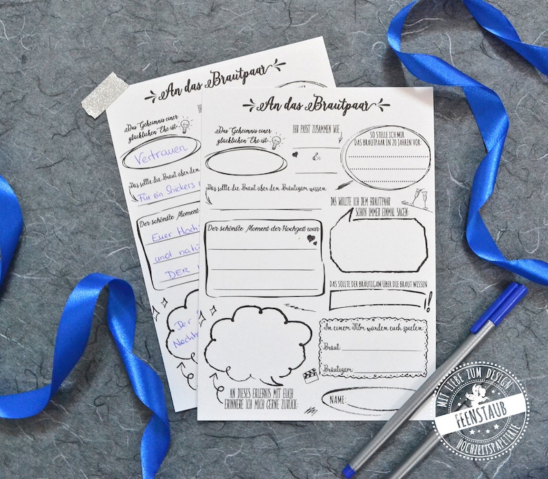 May include: A printable wedding guest book with a black and white design. The text on the page reads "An das Brautpaar" which translates to "To the Bride and Groom".