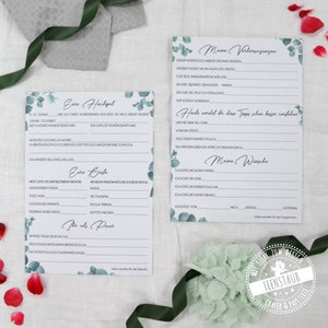 May include: Two printable cards with a eucalyptus theme. The first card has the title "Our Wedding" and asks questions about the wedding day. The second card has the title "My Predictions" and asks questions about the couple's future.