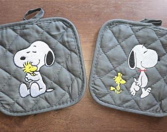 Agarraderas bordadas de Snoopy