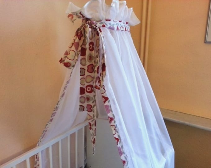 Delicate bed canopy with desired border and bow from Atelier MiaMia
