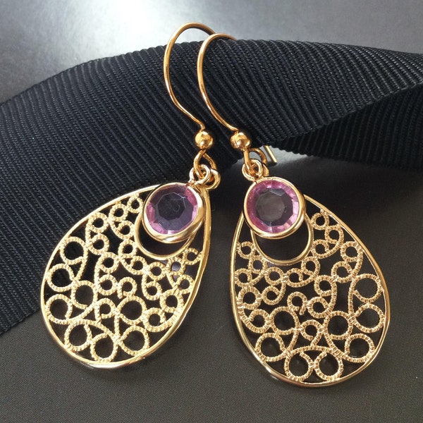 Ornament earrings with jewelry glass