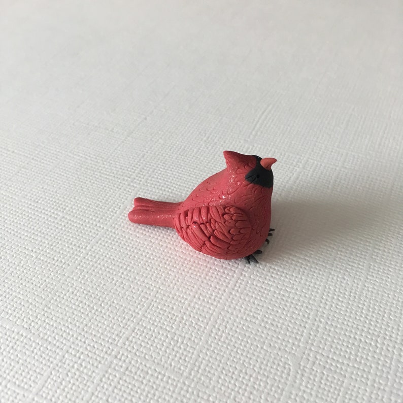 tiny cardinal figurines
