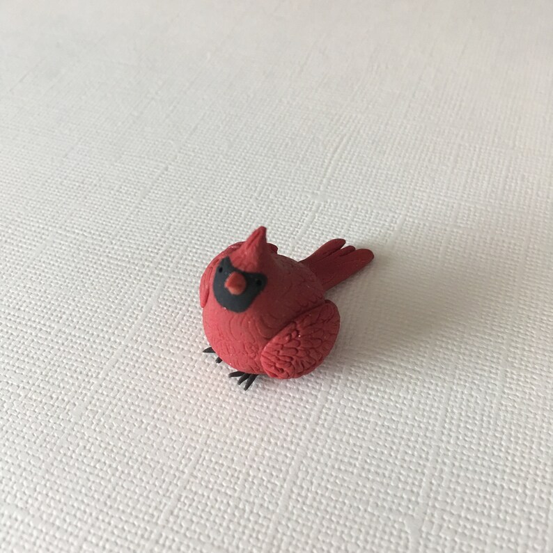 tiny cardinal figurines