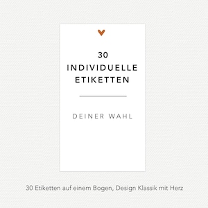 May include: A white card with the text "30 INDIVIDUELLE ETIKETTEN" and "DEINER WAHL" in black. A small brown heart is at the top. The card is on a textured white background.