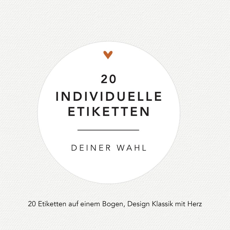 May include: A white circular sticker with the text "20 INDIVIDUELLE ETIKETTEN DEINER WAHL" in black. Above the text is a small orange heart. The sticker is on a white background.