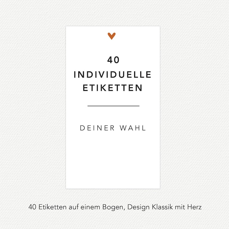 May include: A white rectangular card with the text "40 INDIVIDUELLE ETIKETTEN" in black. Below the text is the phrase "DEINER WAHL". A small brown heart is at the top. The bottom of the card reads "40 Etiketten auf einem Bogen, Design Klassik mit Herz".
