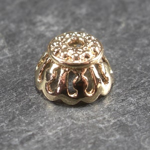 2 bead caps, brass, 24 K gold-plated, 10708