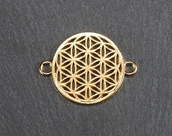 Puede incluir: Encanto de metal dorado con un diseño circular con un patrón de flor de la vida. El encanto tiene dos pequeños bucles en el lateral para sujetarlo a joyas u otras manualidades.