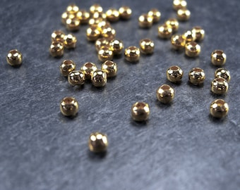 50 small beads 3 mm, gold-colored, 10206
