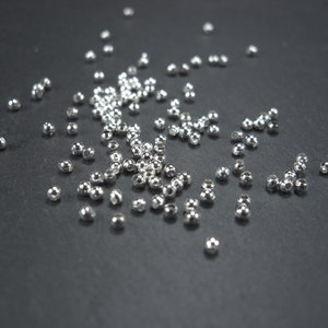 50 small beads 2 mm, silver-colored, 10230