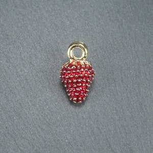 2 strawberry pendants, red enamelled, gold-coloured, 10530