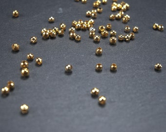 50 small beads 2.5 mm, gold-colored, 10203