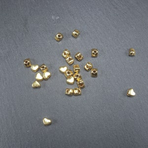 50 mini heart beads, antique gold-colored, 10417